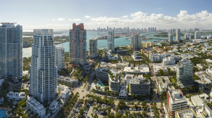 Miami Beach city American southern architecture. South Beach high luxurious hotels and apartment buildings. Tourist infrastructure in southern Florida, USA.